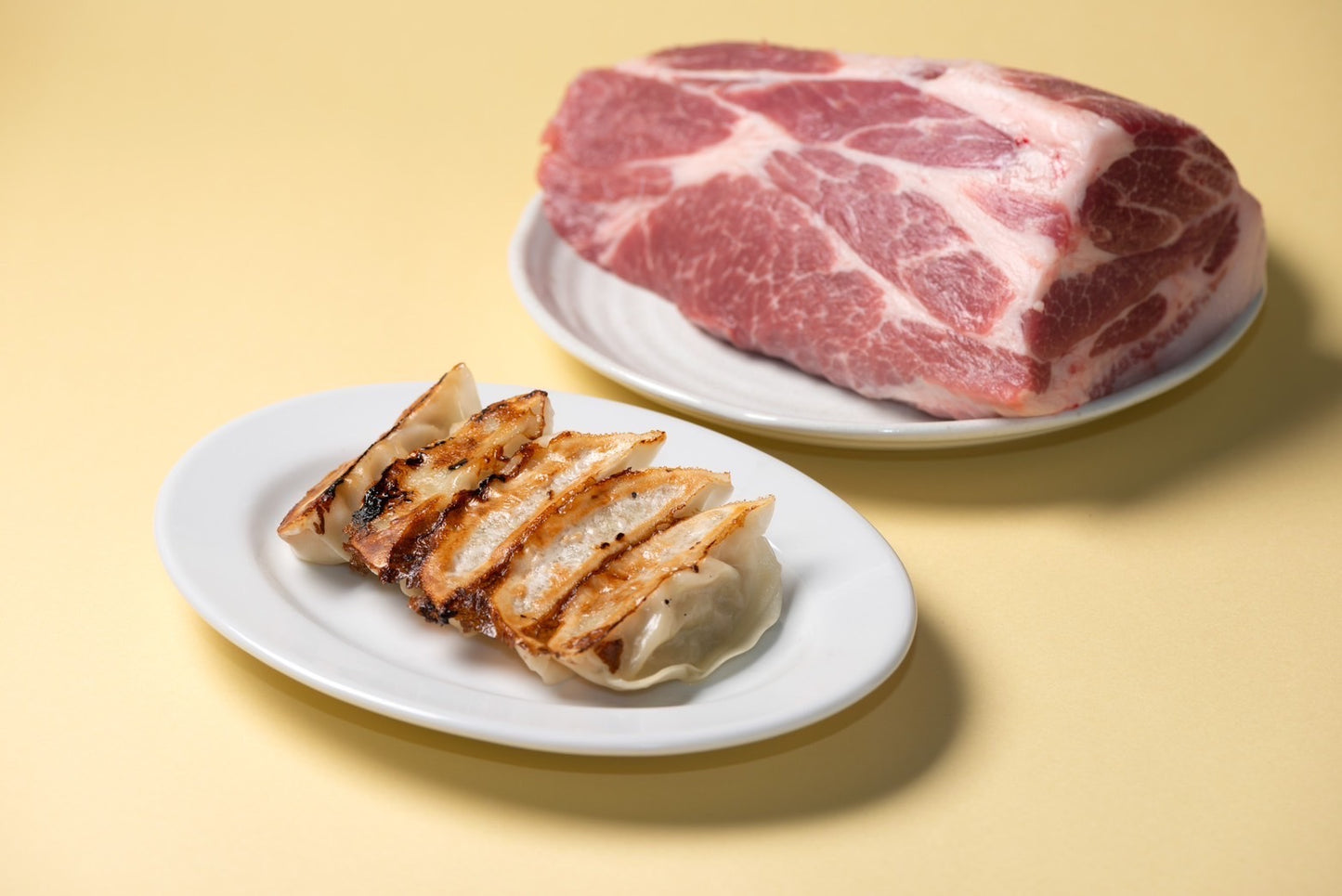 【お試しセット】スパイス餃子と黒豚餃子の25個入りセット 計50個